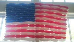 Woven out of pencil neck balloons the American Flag at the Hidden Valley Country Club event